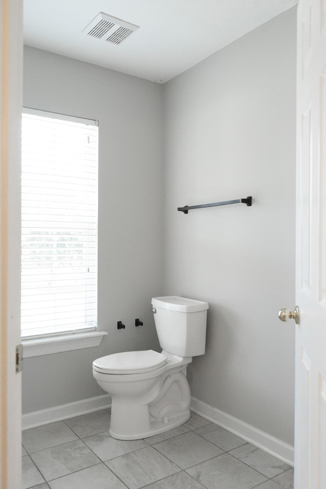 724 Avrett Cir, Evans, GA 30809 - bathroom featuring toilet and baseboards