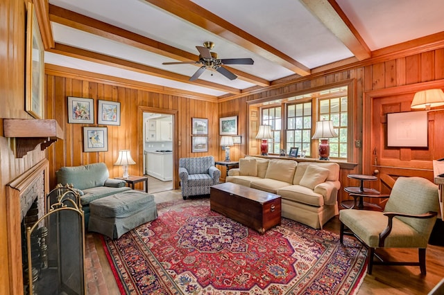 3410 Walton Way, Augusta, GA 30909 - living room featuring a fireplace, beamed ceiling, a ceiling fan, wood walls, and wood finished floors