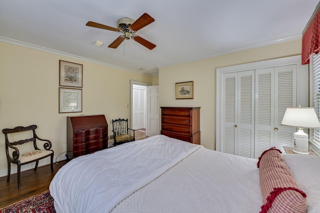3410 Walton Way, Augusta, GA 30909 - bedroom with a closet, crown molding, wood finished floors, and a ceiling fan