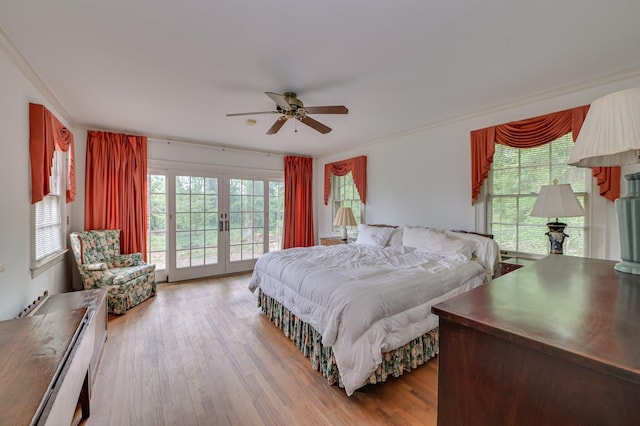 3410 Walton Way, Augusta, GA 30909 - bedroom featuring access to exterior, french doors, multiple windows, wood finished floors, and ornamental molding