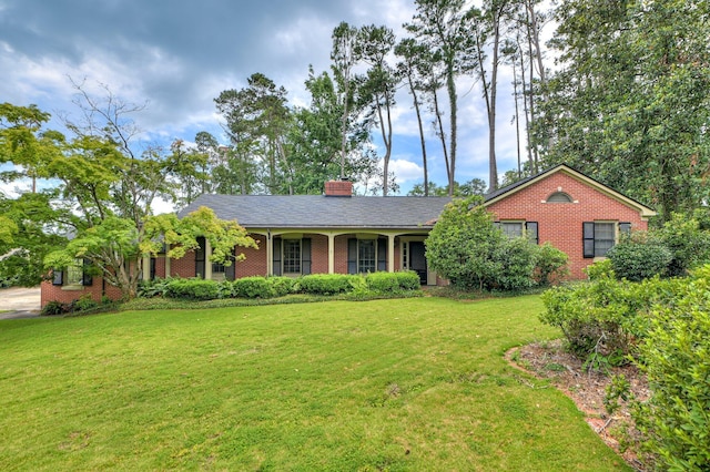 3410 Walton Way, Augusta, GA 30909 - ranch-style house with brick siding, a front lawn, and a chimney