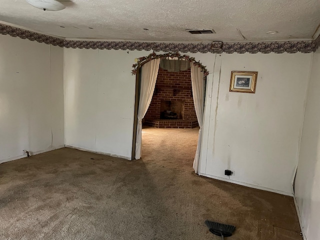 1466 Swanee Quintet Blvd, Augusta, GA 30901 - unfurnished room featuring carpet floors, a textured ceiling, and a fireplace