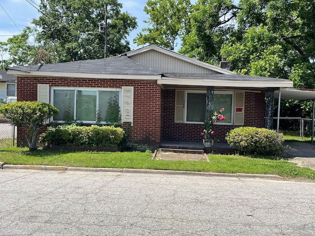 1466 Swanee Quintet Blvd, Augusta, GA 30901 - view of front facade with brick siding, a porch, and roof with shingles