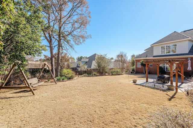 view of yard featuring a patio area and a fenced backyard