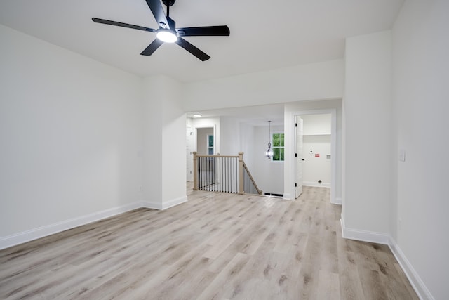 3909 Lakeside Pass, Hephzibah, GA 30815 - spare room featuring light wood-type flooring, baseboards, and a ceiling fan