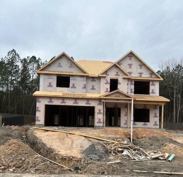 property under construction featuring a garage