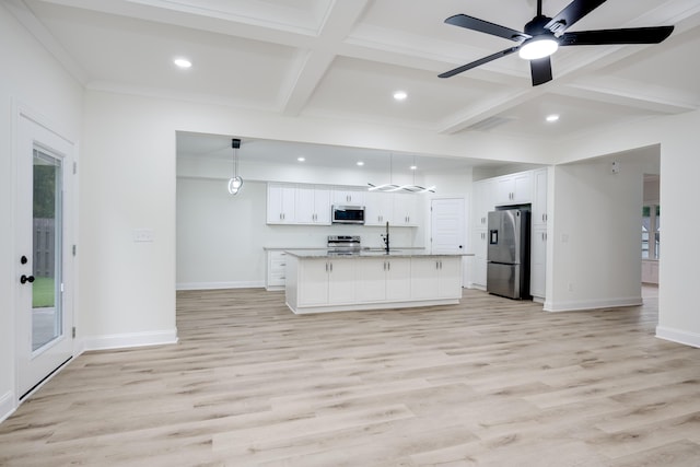 3909 Lakeside Pass, Hephzibah, GA 30815 - kitchen with stainless steel appliances, coffered ceiling, baseboards, white cabinets, and light wood finished floors