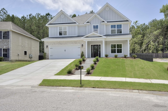 3909 Lakeside Pass, Hephzibah, GA 30815 - craftsman house featuring board and batten siding, driveway, a garage, and a shingled roof