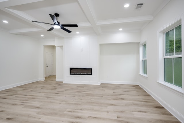 3909 Lakeside Pass, Hephzibah, GA 30815 - unfurnished living room with healthy amount of natural light, beam ceiling, light wood finished floors, coffered ceiling, and recessed lighting