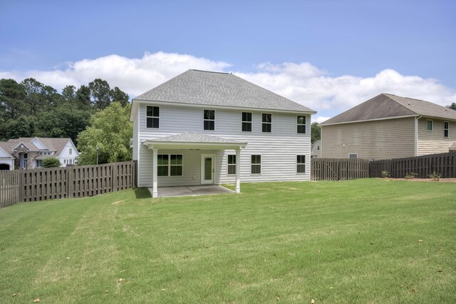 3909 Lakeside Pass, Hephzibah, GA 30815 - back of property featuring a patio and roof with shingles