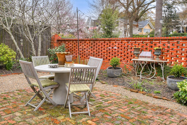 view of patio with outdoor dining area