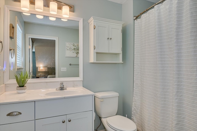 1076 Conn Dr, Evans, GA 30809 - bathroom featuring vanity, toilet, ensuite bath, and curtained shower