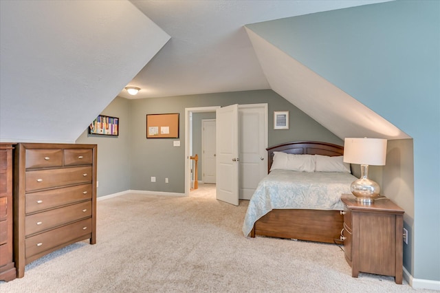 1076 Conn Dr, Evans, GA 30809 - bedroom featuring carpet, vaulted ceiling, and baseboards
