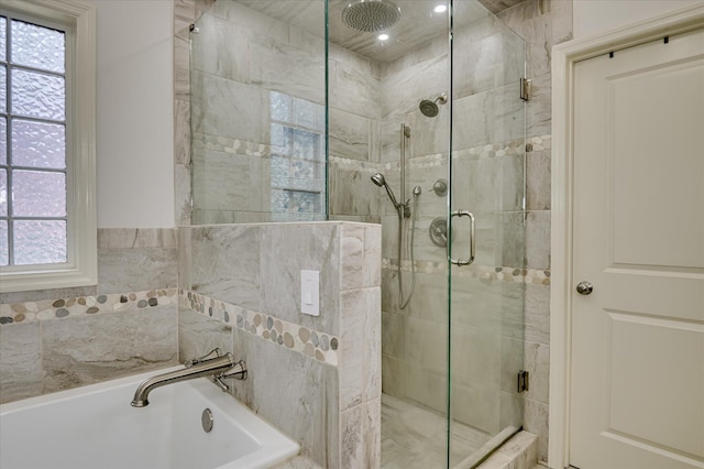 1076 Conn Dr, Evans, GA 30809 - full bathroom featuring a shower stall, a garden tub, and healthy amount of natural light