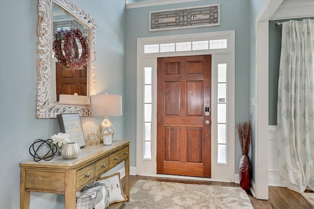 1076 Conn Dr, Evans, GA 30809 - entrance foyer with wood finished floors, healthy amount of natural light, and baseboards