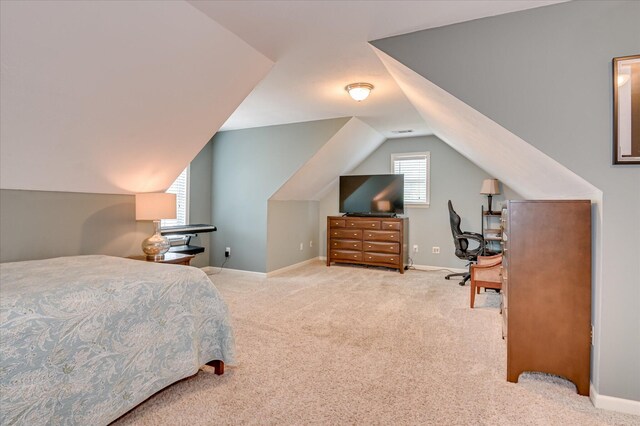 1076 Conn Dr, Evans, GA 30809 - bedroom with lofted ceiling, carpet flooring, baseboards, and a desk
