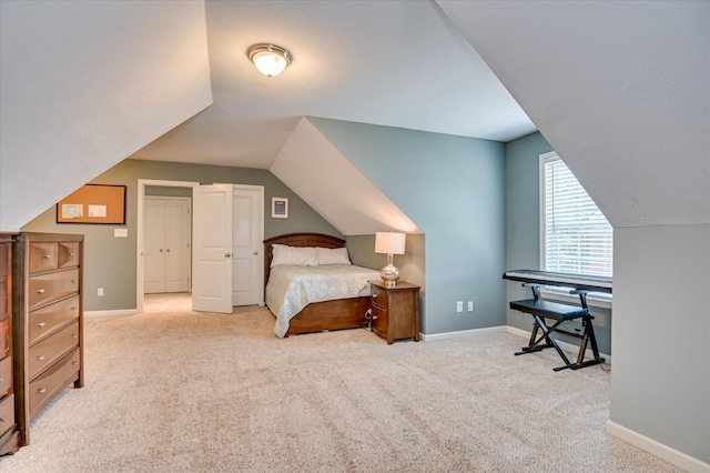 1076 Conn Dr, Evans, GA 30809 - bedroom with carpet flooring, baseboards, and lofted ceiling