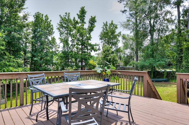 1076 Conn Dr, Evans, GA 30809 - wooden terrace with outdoor dining area and view of scattered trees