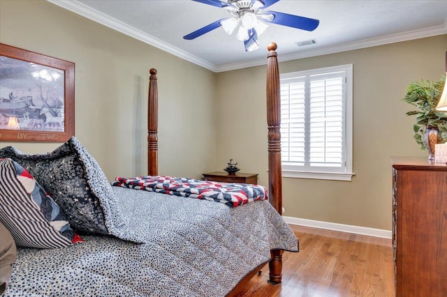 114 Nicoles Way, Grovetown, GA 30813 - bedroom with crown molding, wood finished floors, ceiling fan, baseboards, and visible vents