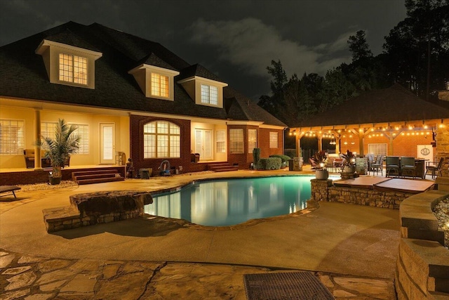 114 Nicoles Way, Grovetown, GA 30813 - pool at night with an outdoor pool, entry steps, and a patio