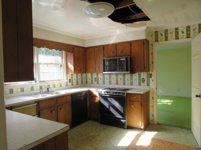 4629 Silver Lake Dr, Evans, GA 30809 - kitchen featuring a sink, wallpapered walls, brown cabinetry, light countertops, and black appliances