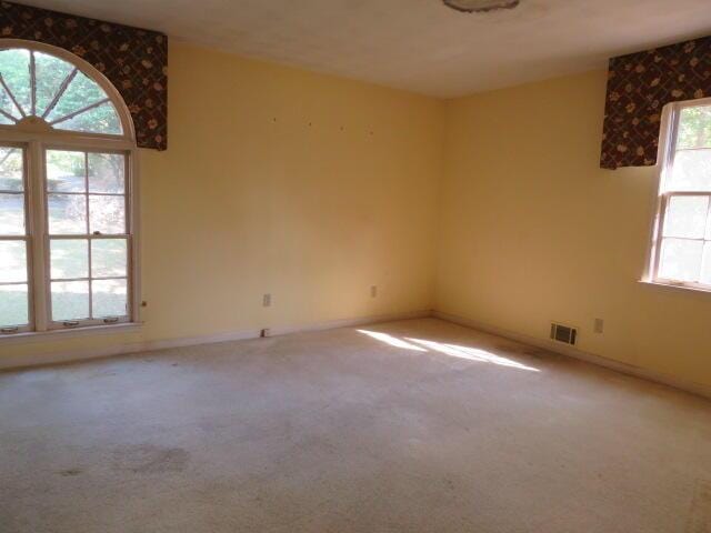 4629 Silver Lake Dr, Evans, GA 30809 - spare room with baseboards, visible vents, and carpet