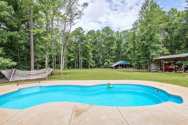 view of swimming pool featuring a gazebo and a lawn