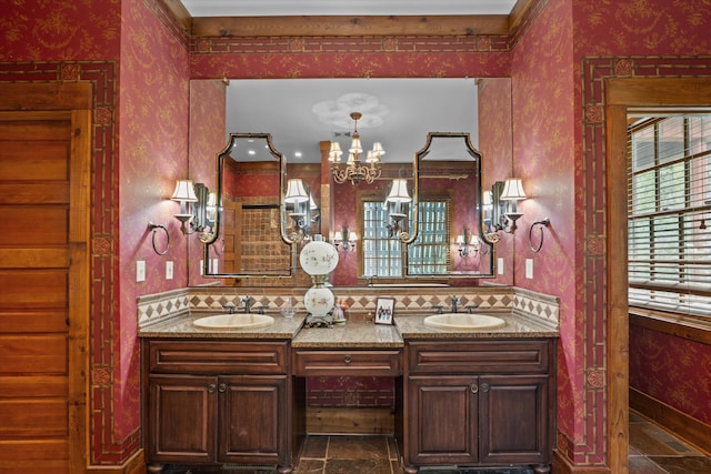 bathroom featuring vanity and an inviting chandelier