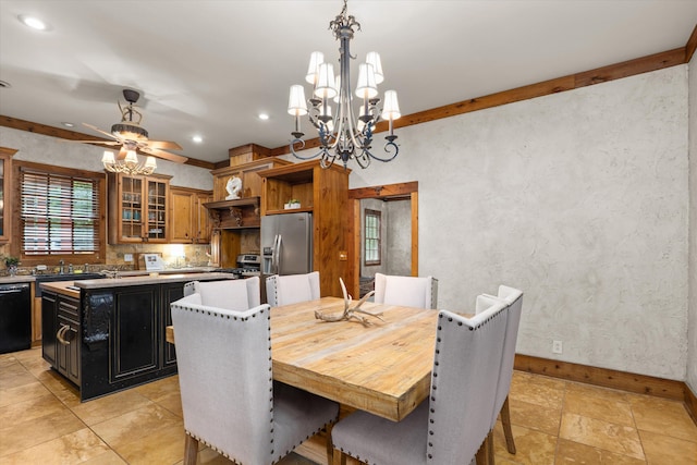 dining space with ceiling fan with notable chandelier and ornamental molding