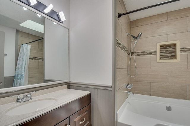 bathroom with vanity and shower / bath combo