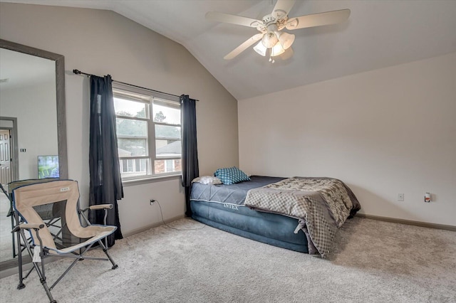 bedroom featuring light carpet, vaulted ceiling, and ceiling fan