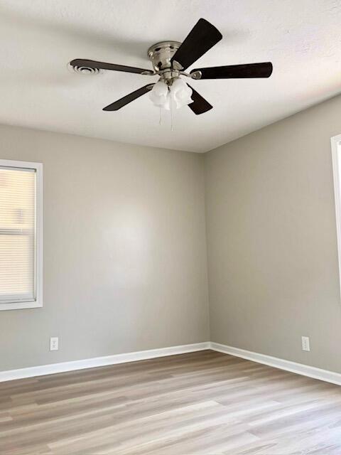 2060 Morning Dr, Augusta, GA 30906 - spare room with light wood-style flooring, baseboards, and a ceiling fan