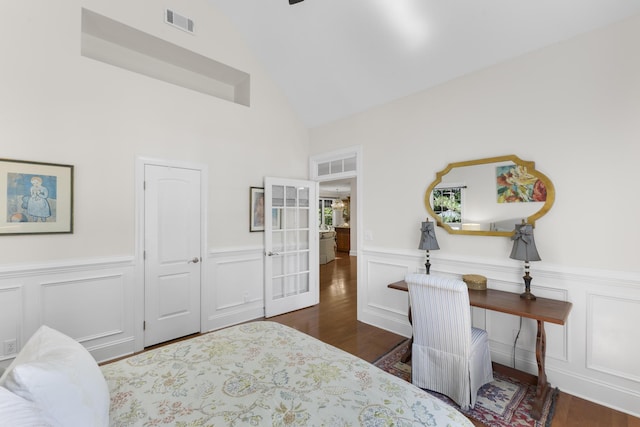 108 Pine Needle Rd, Aiken, SC 29803 - bedroom with wood finished floors, a wainscoted wall, a decorative wall, and high vaulted ceiling