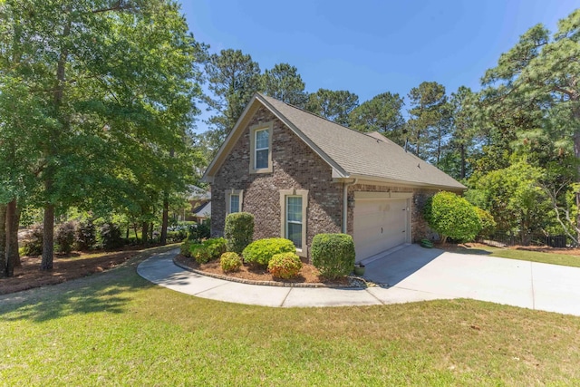 108 Pine Needle Rd, Aiken, SC 29803 - view of property exterior with driveway, brick siding, a lawn, roof with shingles, and a garage
