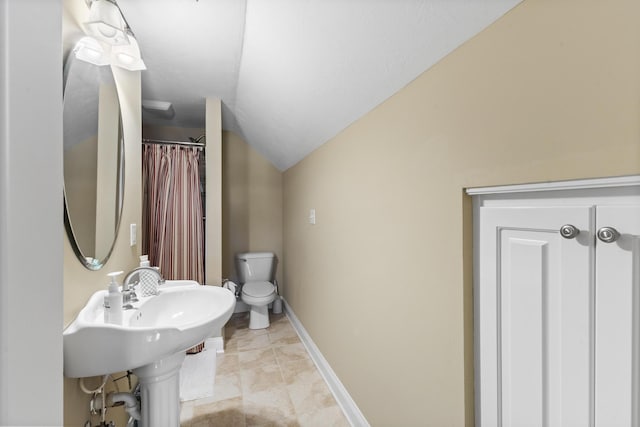 108 Pine Needle Rd, Aiken, SC 29803 - bathroom with lofted ceiling, toilet, a shower with shower curtain, baseboards, and tile patterned floors