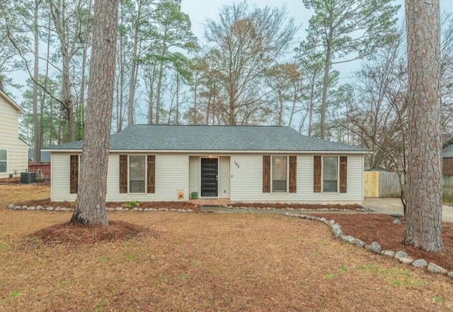 ranch-style home with central AC unit