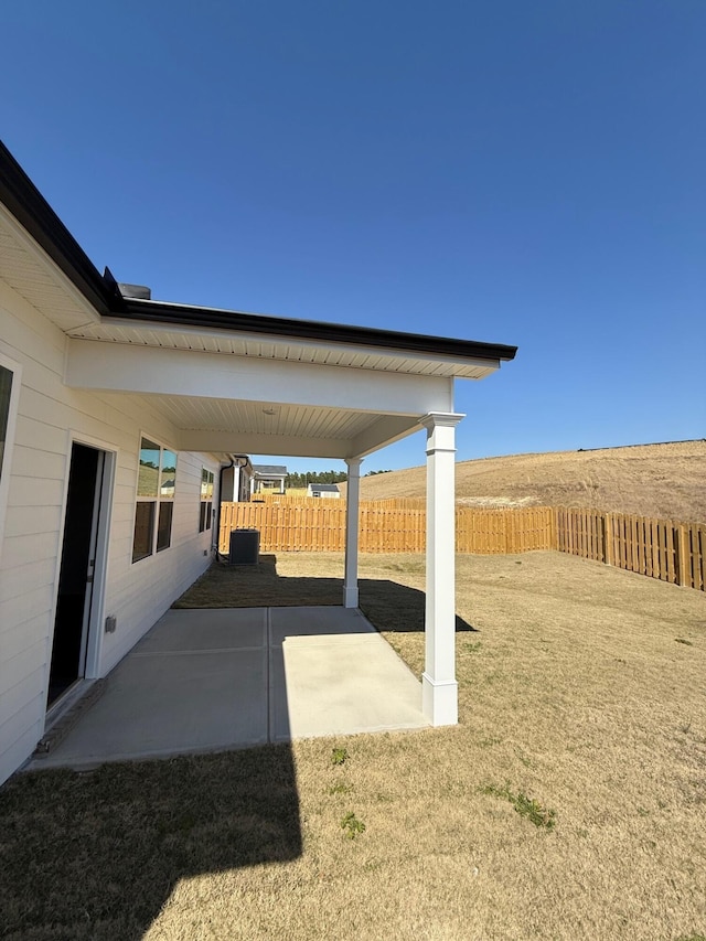 exterior space with a fenced backyard