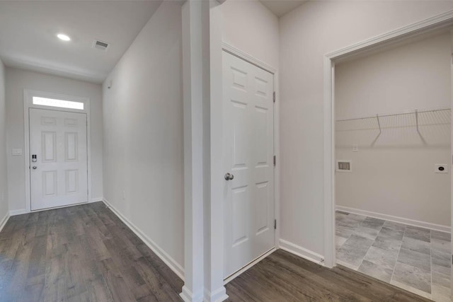 interior space with dark hardwood / wood-style flooring