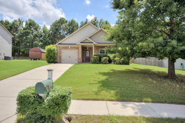 2306 Peach Blossom Pass, Hephzibah, GA 30815 - craftsman house with concrete driveway, brick siding, and an attached garage