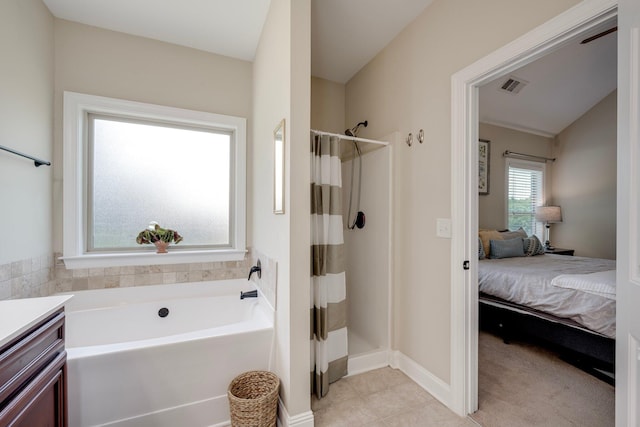 2306 Peach Blossom Pass, Hephzibah, GA 30815 - full bath featuring a shower with shower curtain, a garden tub, ensuite bathroom, vanity, and tile patterned flooring