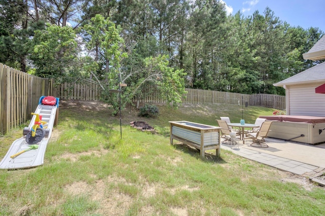 2306 Peach Blossom Pass, Hephzibah, GA 30815 - fenced backyard featuring a hot tub and a patio area