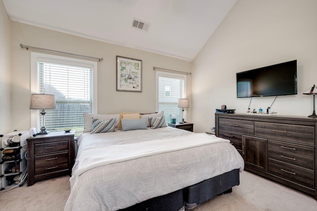 2306 Peach Blossom Pass, Hephzibah, GA 30815 - bedroom featuring light colored carpet, multiple windows, and vaulted ceiling