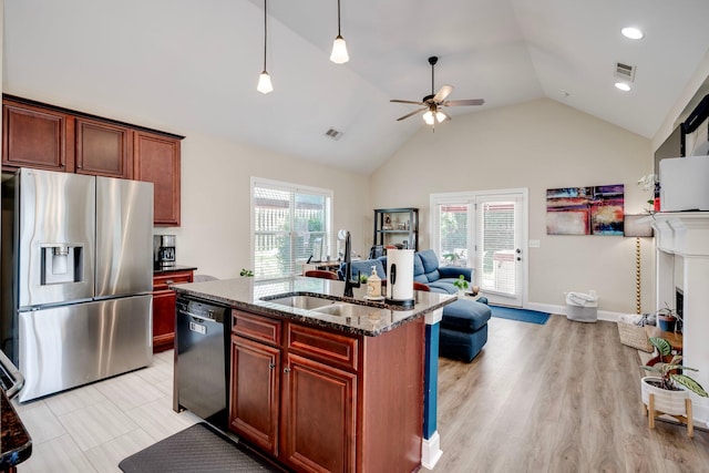 2306 Peach Blossom Pass, Hephzibah, GA 30815 - kitchen with stainless steel fridge with ice dispenser, black dishwasher, dark stone counters, a ceiling fan, and open floor plan