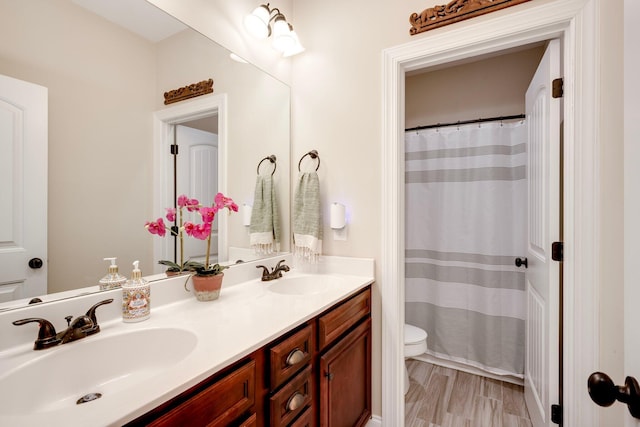 2306 Peach Blossom Pass, Hephzibah, GA 30815 - bathroom with toilet and double vanity