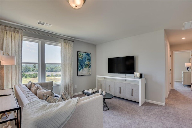 living room featuring light colored carpet