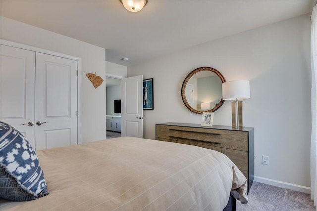 bedroom with carpet flooring and a closet