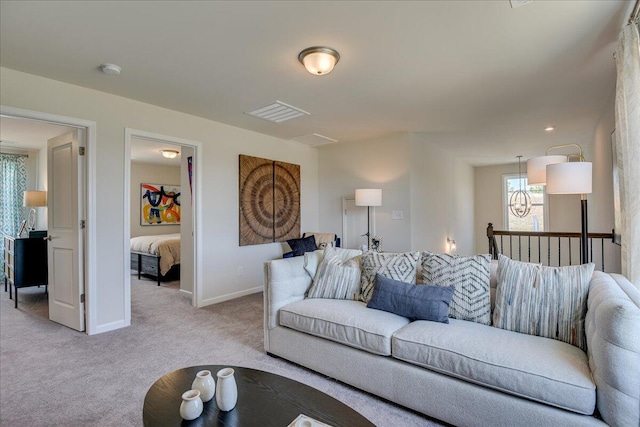 living room with light colored carpet