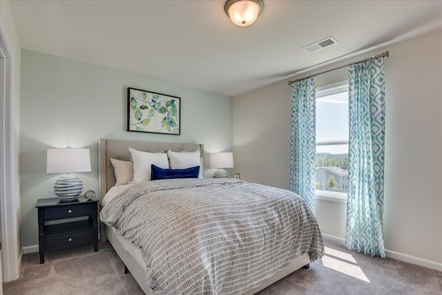 bedroom featuring carpet