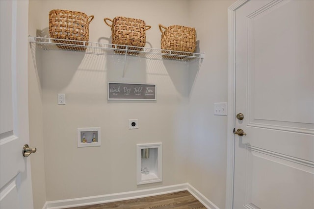 laundry area with electric dryer hookup, dark wood-type flooring, and hookup for a washing machine