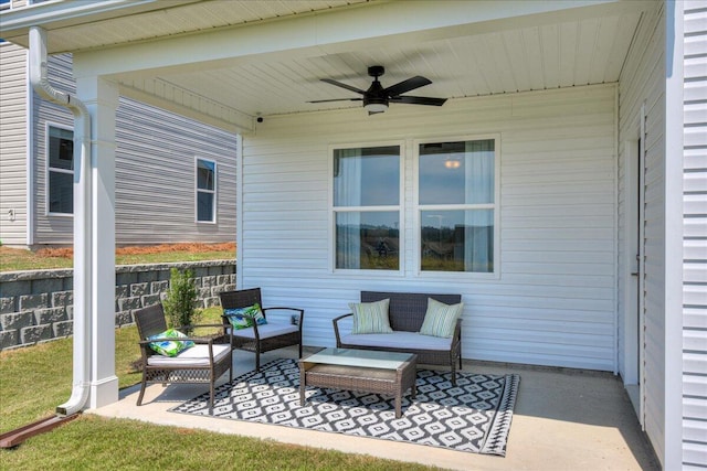 view of patio with outdoor lounge area and ceiling fan